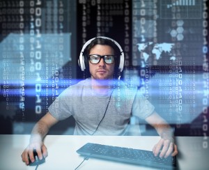 technology, cyberspace, virtual reality and people concept - man or hacker in headset and eyeglasses with keyboard hacking computer system or programming over binary code projection
